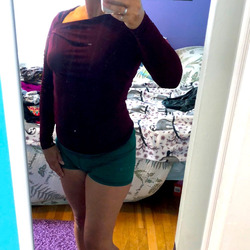 Victoria Secret burgundy fitted shirt. Asymmetrical neckline